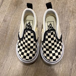 Brand new Vans size 6 checkered slip on